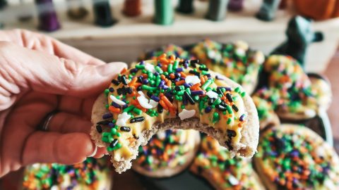Pumpkin spice Halloween sugar cookies with frosting and sprinkles