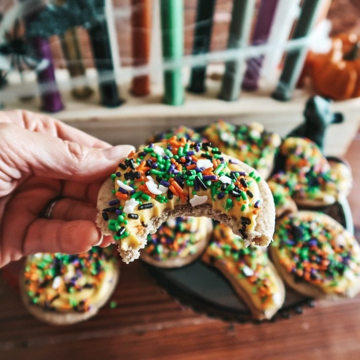 Pumpkin spice Halloween sugar cookies with frosting and sprinkles