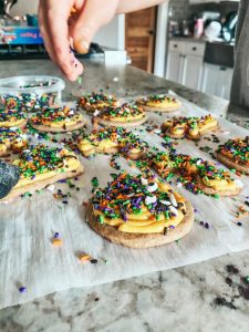 decorating the Pumpkin Spice Halloween Sugar Cookies