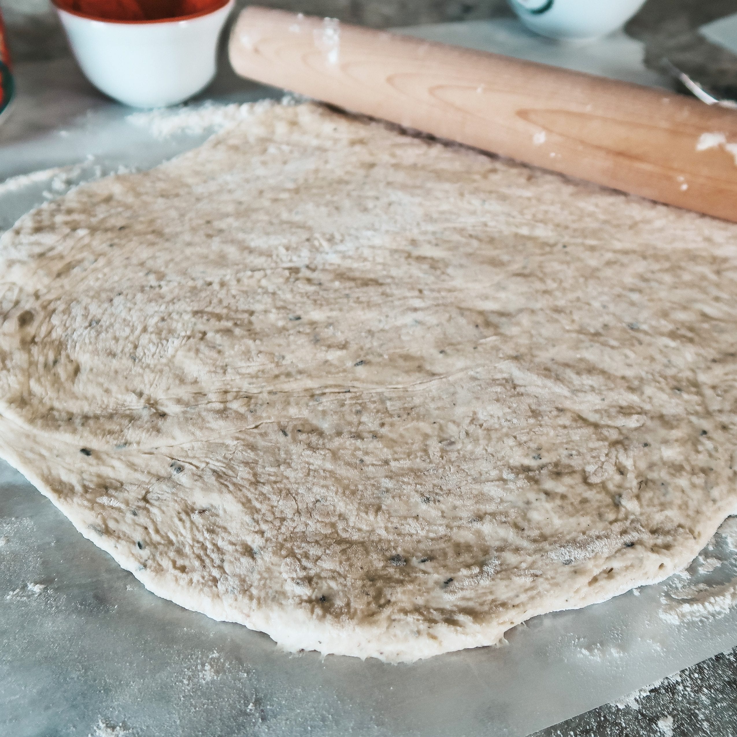 rolling out the pizza dough