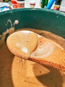 Adding the cheese to the sauce