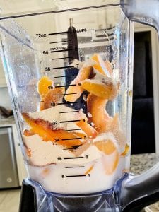Adding the liquid ingredients to smoothie mix