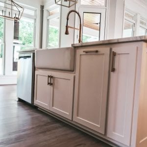 White Kitchen Cabinets with white apron front sink