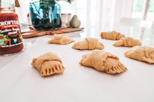 rolling up the crescent rolls