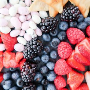 red and blue fruit with yogurt covered raisins