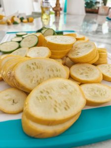cutting up the squash and zucchini