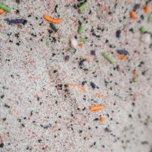 mixing up the sugar, sprinkles, and cinnamon