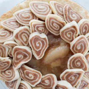 addding the mini cinnamon rolls to the top