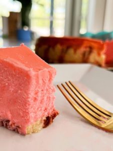 a slice of pink Easter cheesecake