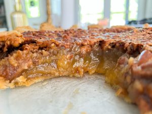 sugary custard filling of a pecan pie