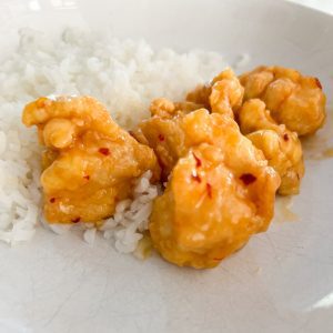 orange chicken and rice plated